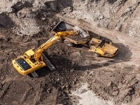 aerial view of excavator and truck